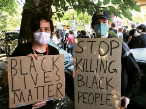 The author’s son, Liko, at a Black Lives Matter protest with his friend, Aiden.