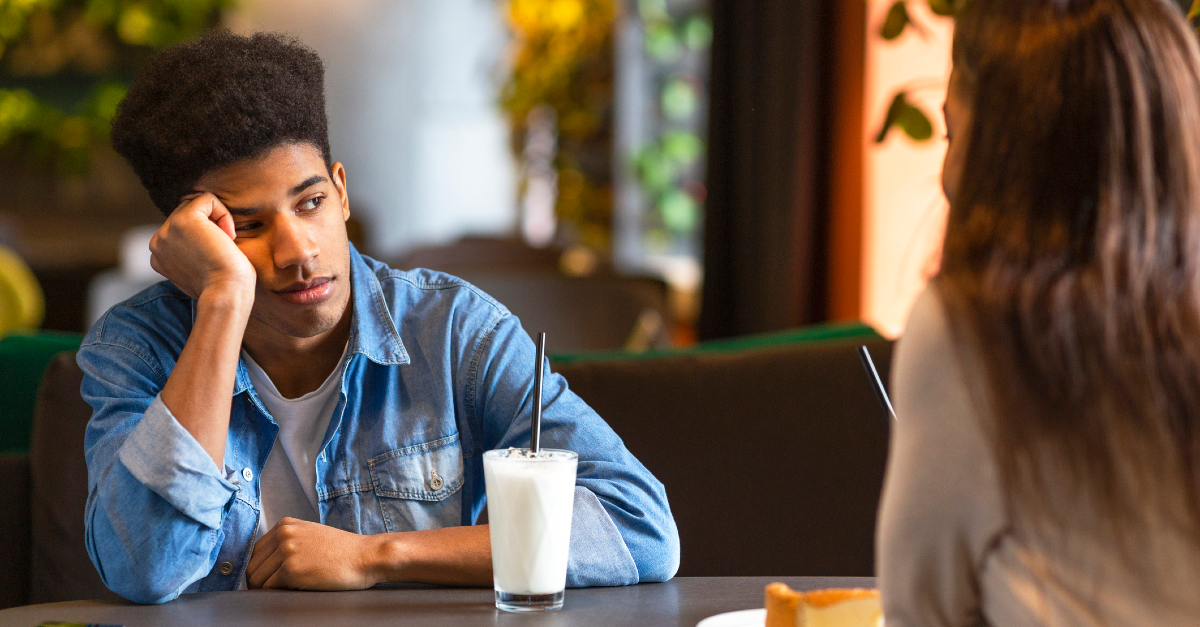 man bored on a date