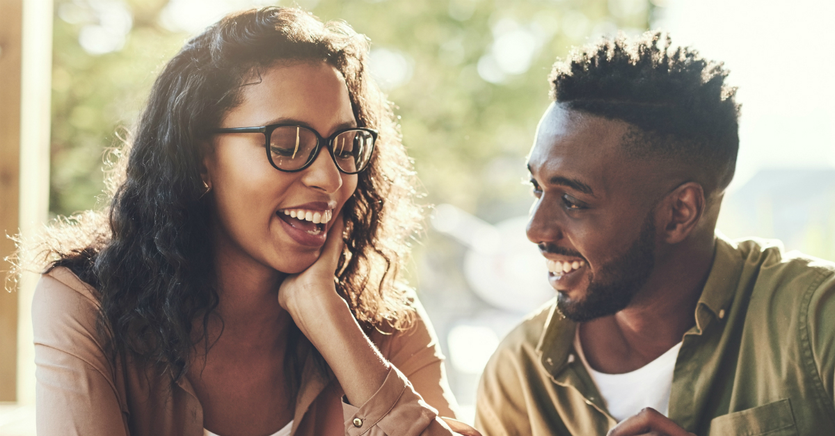 Couple laughing and talking