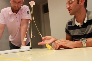 A team works on the Marshmallow Challenge.