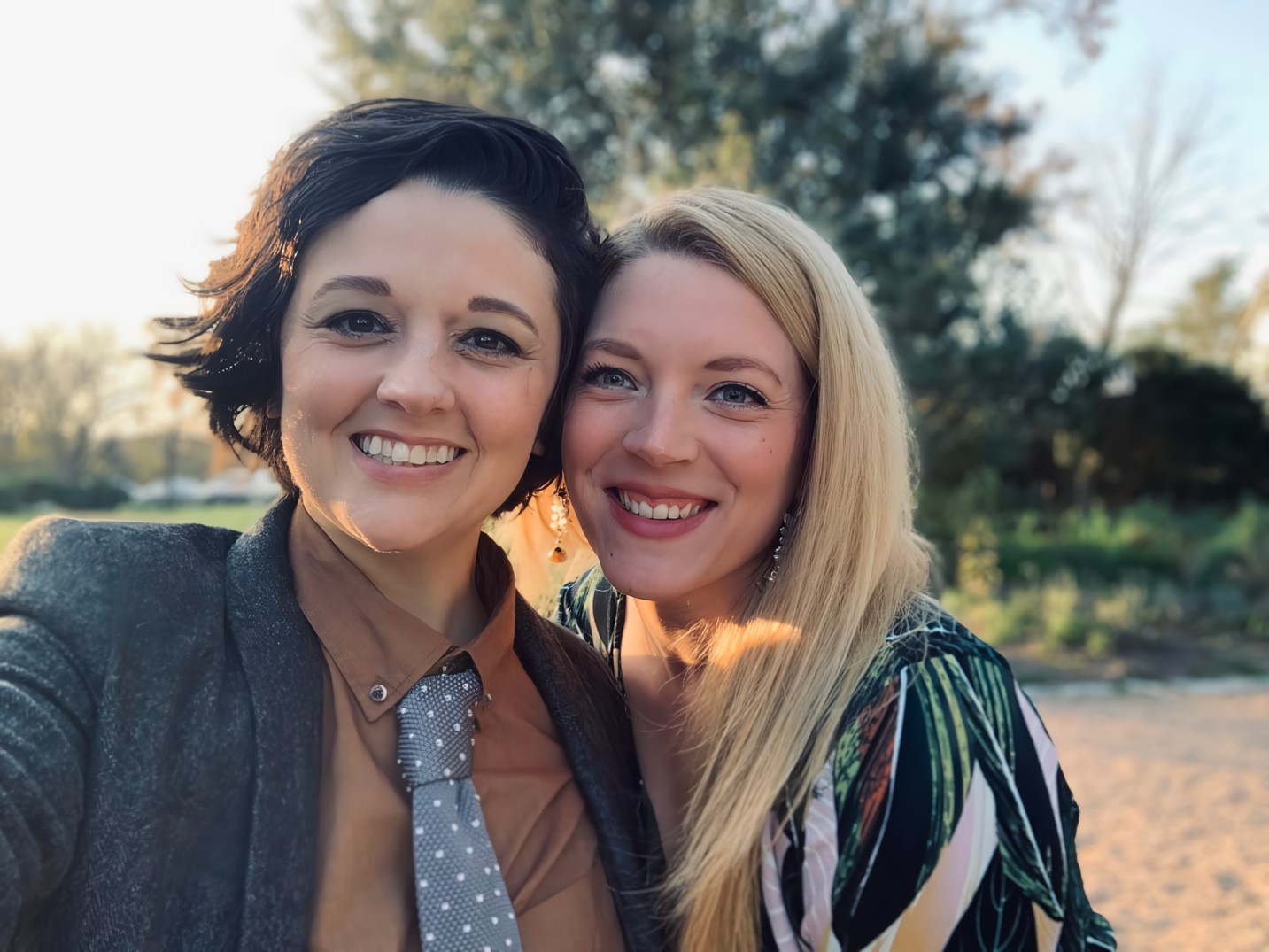 Candace and Michelle, a happy couple who met on OkCupid in 2013, celebrating their journey from online messaging to marriage and motherhood.